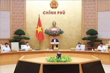 El primer ministro Pham Minh Chinh habla en la reunión. (Foto: VNA)