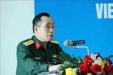 El subdirector del Departamento de Operaciones de Mantenimiento de la Paz, coronel Nguyen Nhu Canh, interviene en la cita (Foto: VNA)