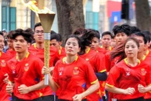 La antorcha de los SEA Games 32 fue llevada por más de 200 atletas vietnamitas (Foto: VNA)