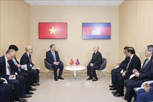 El secretario general del Partido Comunista y presidente de Vietnam, To Lam (en la izquierda) y el rey camboyano}, Norodom Sihamoni. (Fuente: VNA)