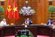 El primer ministro Pham Minh Chinh habla en la reunión. (Fuente: VNA)