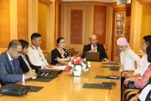 Representantes de ambas partes participantes en el acto para anunciar el modelo de cooperación entre Ciudad Ho Chi Minh y la urbe malasia de Ipoh. (Fuente: VNA)