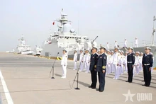 Fuerzas navales vietnamitas y chinas realizan patrulla conjunta. (Fuente: qdnd)