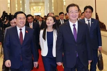 El presidente parlamentario vietnamita se reúne con secretario del Comité partidista de Yunnan. (Foto: VNA)