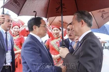 Acto de bienvenida al primer ministro Pham Minh Chinh en el aeropuerto de Nanning. (Foto: VNA)