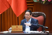 El primer ministro de Vietnam, Pham Minh Chinh, preside la reunión.