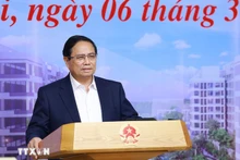 El primer ministro de Vietnam, Pham Minh Chinh, habla en la conferencia. 
