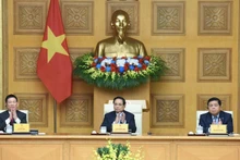 El primer ministro Pham Minh Chinh preside un seminario con empresas estadounidenses.