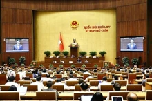 El presidente de la Fiscalía Popular Suprema, Nguyen Huy Tien, aclara una serie de cuestiones planteadas por los diputados de la Asamblea Nacional. (Foto: VNA)