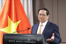 El primer ministro de Vietnam, Pham Minh Chinh, interviene en el encuentro. (Foto: VNA)
