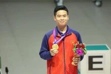 El tirador Pham Quang Huy gana la medalla de oro en ASIAD 2023.