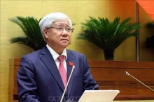 El presidente del Comité Central del Frente de la Patria de Vietnam, Do Van Chien, presenta su informe. (Fotografía: VNA)