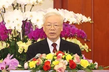 El secretario general del PCV, Nguyen Phu Trong, interviene en la cita. (Fotografía: VNA)
