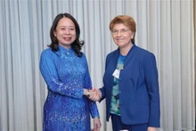 La vicepresidenta de Vietnam, Vo Thi Anh Xuan, y la presidenta de Suiza, Viola Amheard. (Fotografía: VNA)