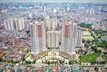 El primer ministro de Vietnam, Pham Minh Chinh , instó a promover el desarrollo seguro, saludable y sostenible del mercado inmobiliario. (Fotografía: VGP)