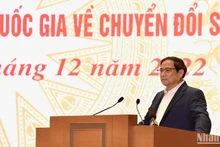 El primer ministro de Vietnam, Pham Minh Chinh, interviene en el simposio. (Fotografía: Nhan Dan)
