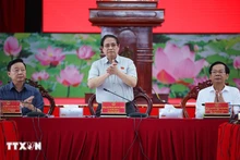 El primer ministro de Vietnam, Pham Minh Chinh, preside la reunión. (Fotografía: VNA)