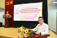 El presidente-editor de Nhan Dan, Le Quoc Minh, interviene en el acto. (Fotografía: Nhan Dan)