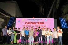 Los estudiantes laosianos, camboyanos y familias vietnamitas en el evento. (Fotografía: VNA)