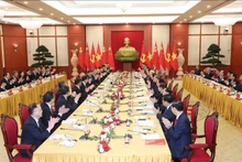 Panorama de la reunión entre el secretario general del Partido Comunista de Vietnam, Nguyen Phu Trong, y el secretario general del Partido Comunista de China y presidente del país, Xi Jinping. (Fotografía: VNA)