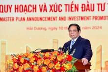 El primer ministro de Vietnam, Pham Minh Chinh, habla en el evento. (Fotografía: Nhan Dan)