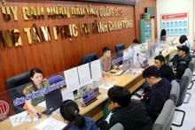 En el Centro de Servicios de Administración Pública de Quang Binh. (Fotografía: VNA)