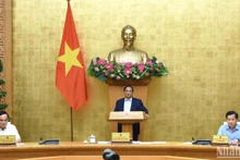 [Foto] Premier vietnamita preside reunión gubernamental sobre formulación de leyes