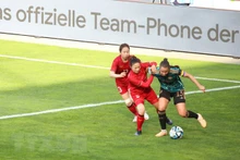 En el partido. (Fotografía: VNA)