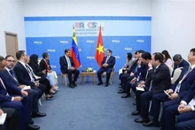 El primer ministro de Vietnam, Pham Minh Chinh, y el presidente de Venezuela, Nicolás Maduro. (Fotografía: VNA)