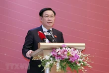 El presidente de la Asamblea Nacional de Vietnam, Vuong Dinh Hue, interviene en el evento.