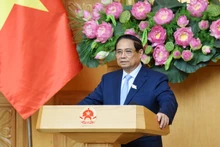 El primer ministro Pham Minh Chinh interviene en la reunión. (Fotografía: Nhan Dan)