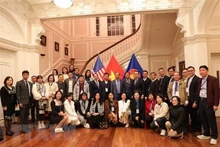 Participantes en el evento. (Fotografía: VNA)
