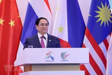[Foto] Premier vietnamita asiste a inauguración de eventos comerciales Asean-China