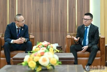 Periódico Nhan Dan y agencia japonesa promueven innovación en campo mediático