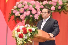 El primer ministro de Vietnam, Pham Minh Chinh, interviene en el acto. (Fotografía: Nhan Dan)