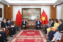 En la reunión. (Fotografía: toquoc.vn)