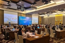 En un evento de conexión empresarial binacional. (Fotografía: VNA)