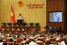 El ministro de Planificación e Inversión, Nguyen Chi Dung, en la sesión. (Fotografía: VNA)