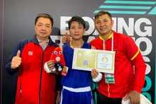 La boxeadora vietnamita Vo Thi Kim Anh (centro). (Fotografía: VNA)