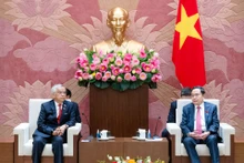 [Foto] Dirigente vietnamita se reúne con presidente del Comité de Paz y Solidaridad de Laos