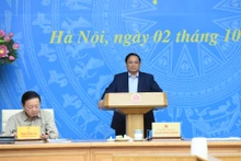 [Foto] Premier preside reunión sobre implementación de los compromisos de Vietnam en la COP26 