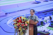 El primer ministro vietnamita, Pham Minh Chinh, habla en el evento. (Fotografía: VNA)
