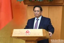 El primer ministro Pham Minh Chinh interviene en la reunión. (Fotografía: Nhan Dan)