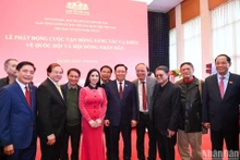 Delegados al acto de lanzamiento. (Fotografía: Nhan Dan)