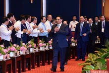 [Foto] Premier vietnamita asiste a conferencia en honor a ciudadanos destacados en sector cultural
