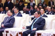 El primer ministro de Vietnam, Pham Minh Chinh, asiste al coloquio. (Fotografía: VNA)