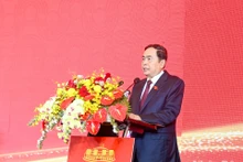 El vicepresidente permanente de la Asamblea Nacional de Vietnam, Tran Thanh Man, habla en la conferencia. (Fotografía: Nhan Dan)