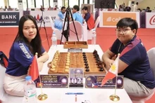 La jugadora vietnamita Doan Thi Hong Nhung (izquierda) en la final. (Fotografía: VNA)