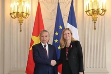 El secretario general del Partido Comunista y presidente de Vietnam, To Lam, y la presidenta de la Asamblea Nacional de Francia, Yael Braun-Pivet. (Fotografía: VNA)