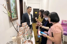 Empresas y socios debaten sobre productos halal para exportación. (Fotografía: hanoimoi.vn)
